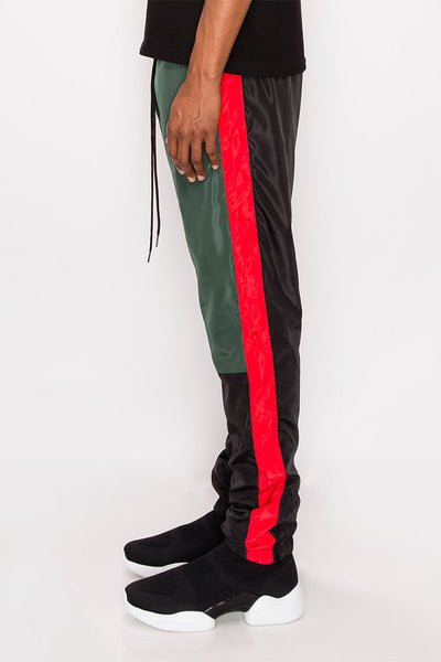 Track pants sale green and red